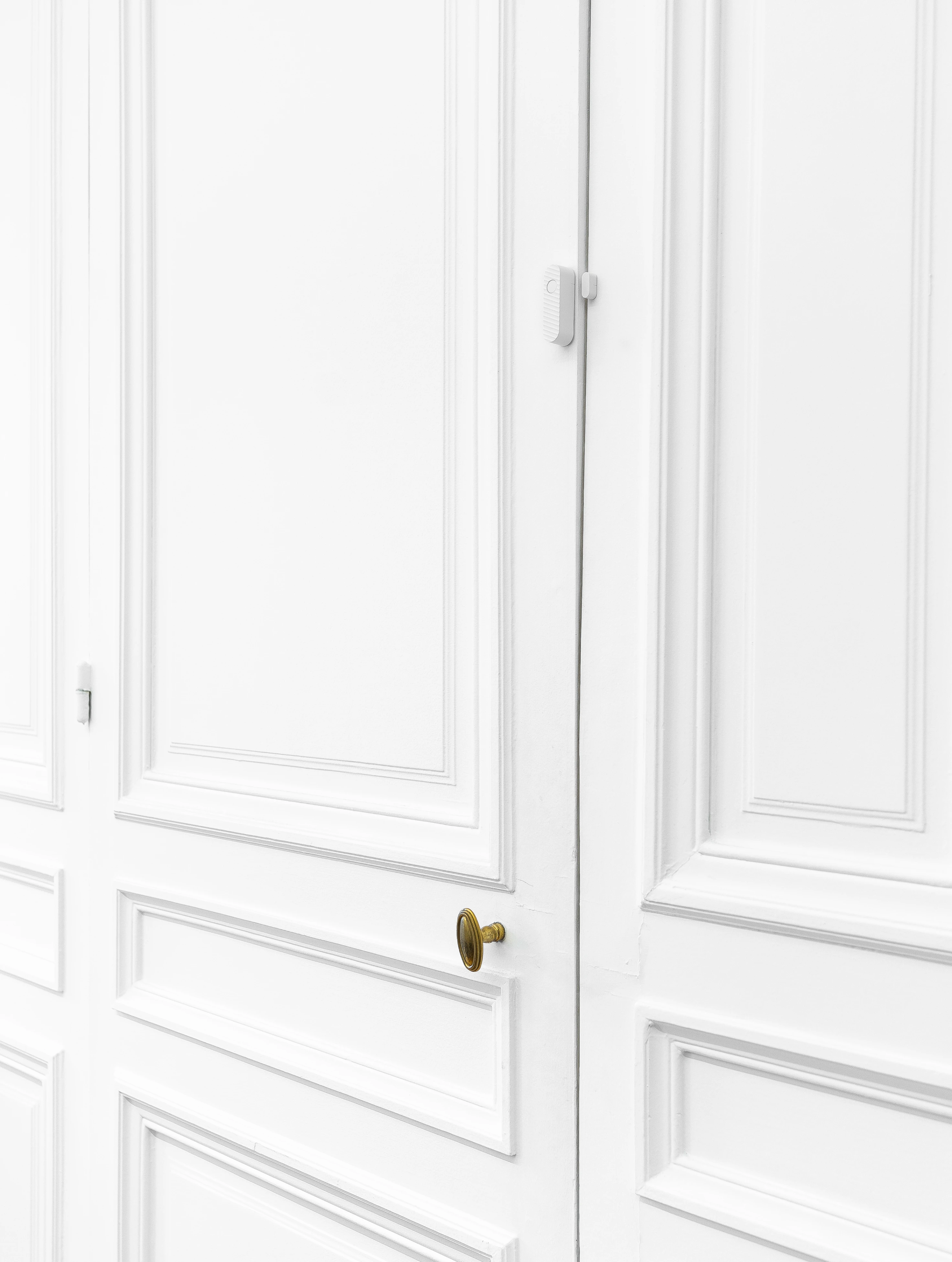 Qiara DWS on a closed white door